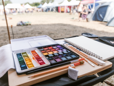 Exactly how to build a festival-ready portable mixed-media kit that survives rain, spills and cramped travel